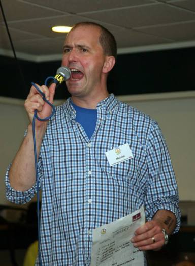 Michael Lord (during the Whisky Quiz). Photo by Rolf Kruger